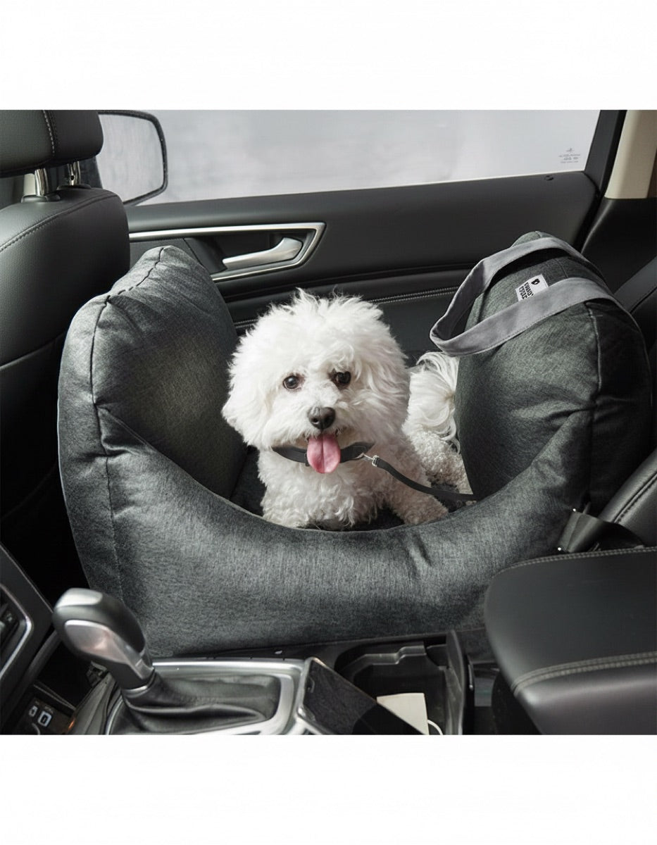 Small dog in waterproof car seat bed